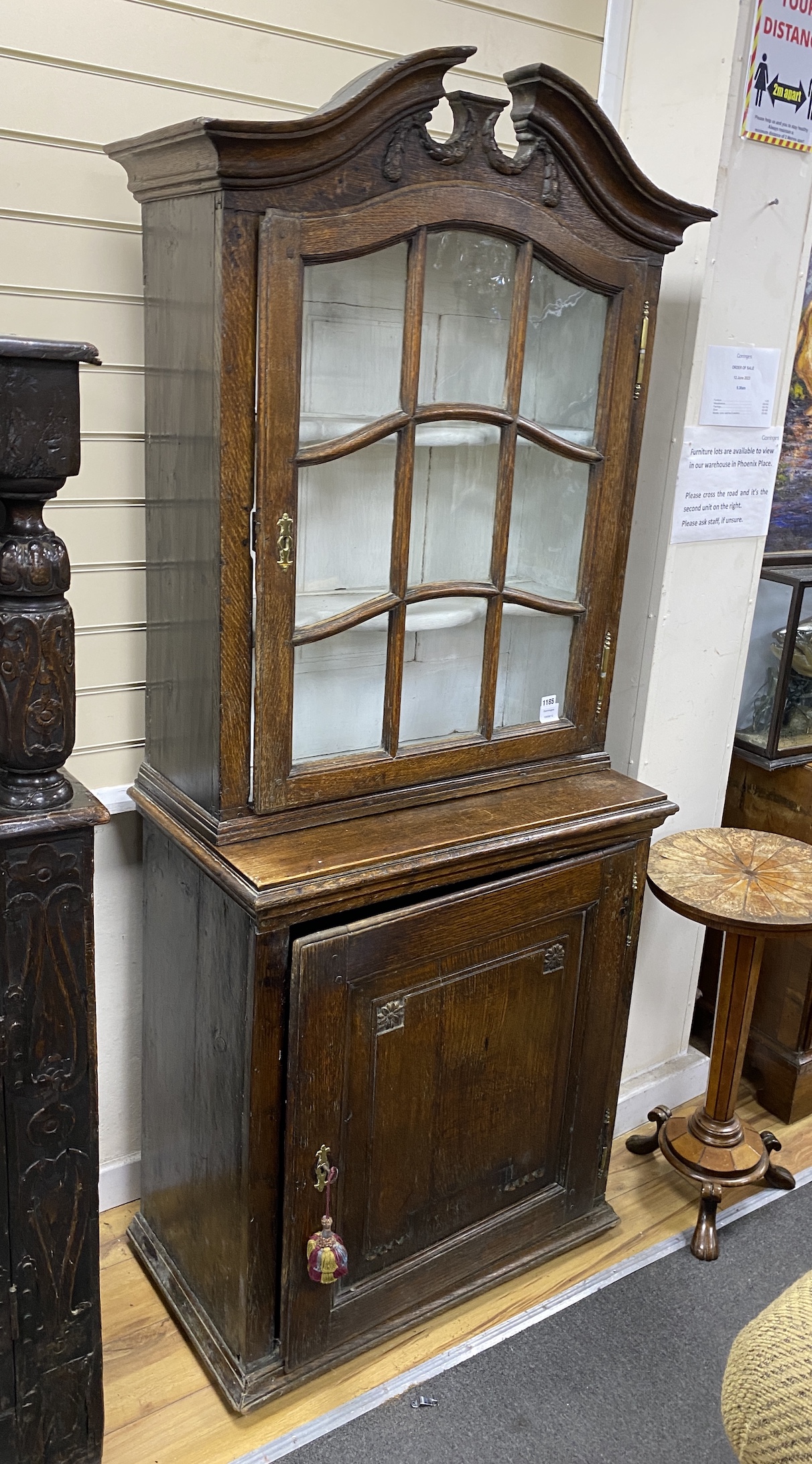 A late 18th / early 19th century Flemish Provincial glazed oak side cabinet, width 81cm, depth 46cm, height 196cm